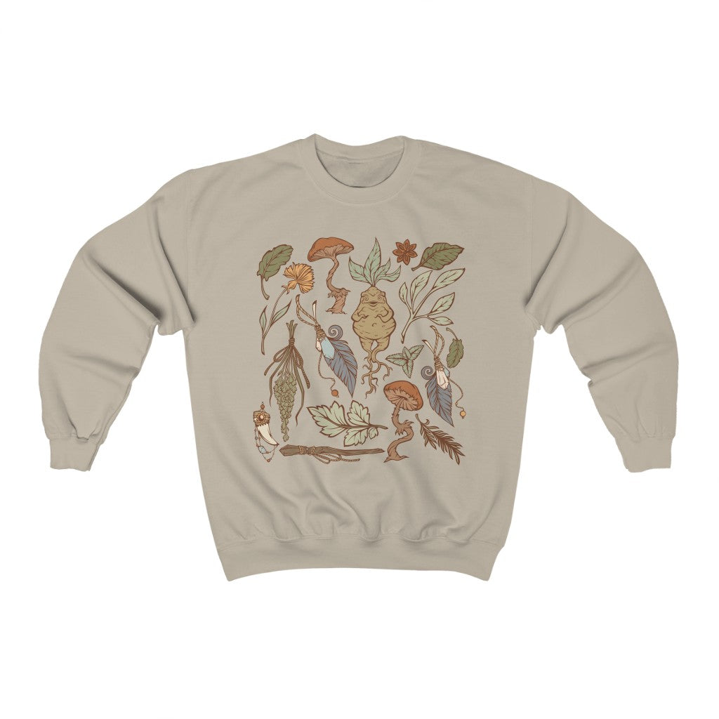 Perfect for the green witch or botany lover. This oversized witchy crewneck sweatshirt features beautiful botanical art. The perfect addition to any witch aesthetic wardrobe.