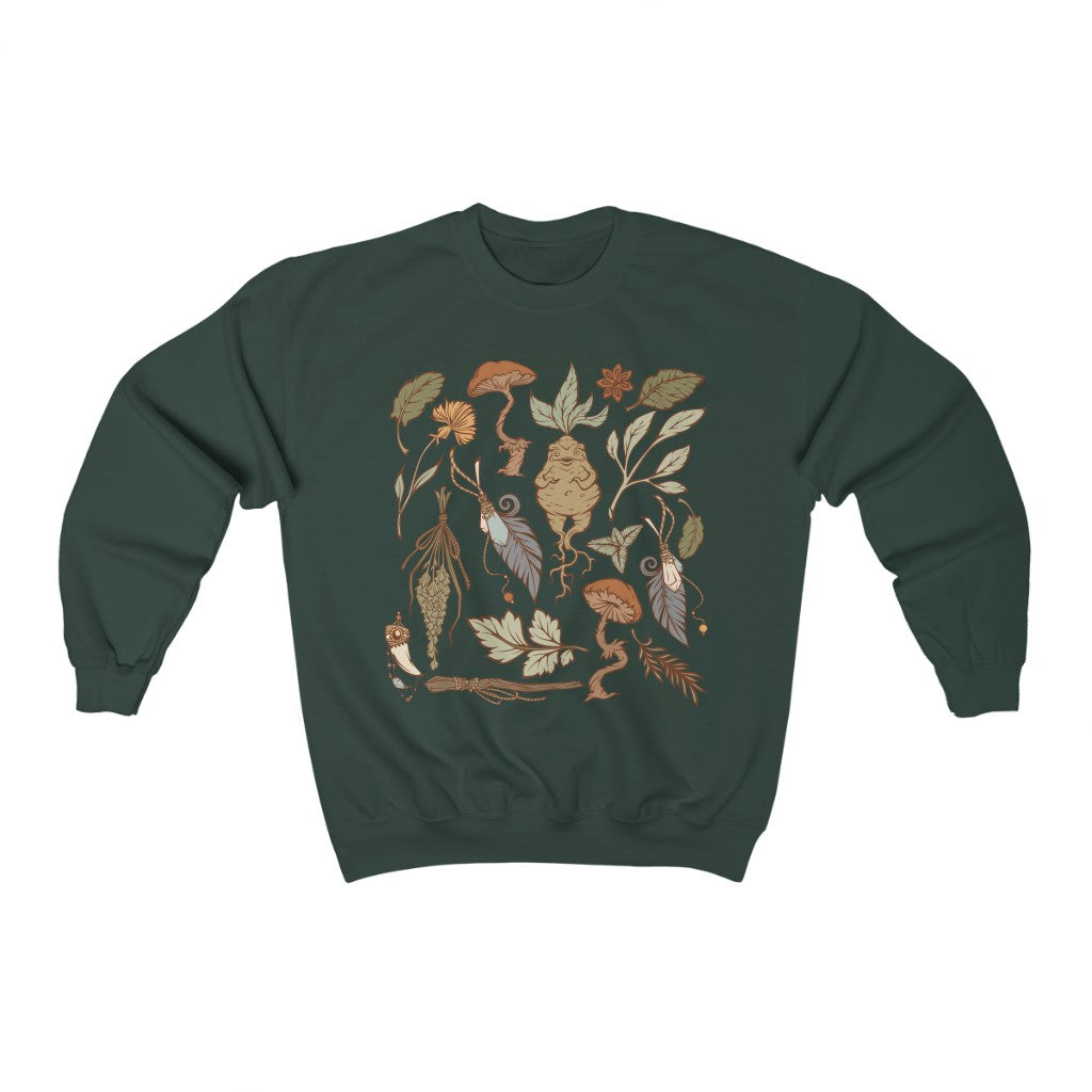 Perfect for the green witch or botany lover. This oversized witchy crewneck sweatshirt features beautiful botanical art. The perfect addition to any witch aesthetic wardrobe.