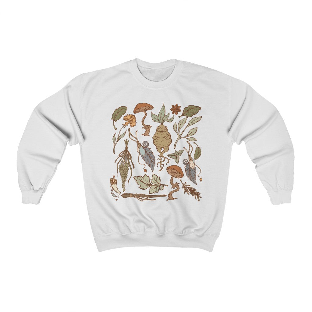 Perfect for the green witch or botany lover. This oversized witchy crewneck sweatshirt features beautiful botanical art. The perfect addition to any witch aesthetic wardrobe.