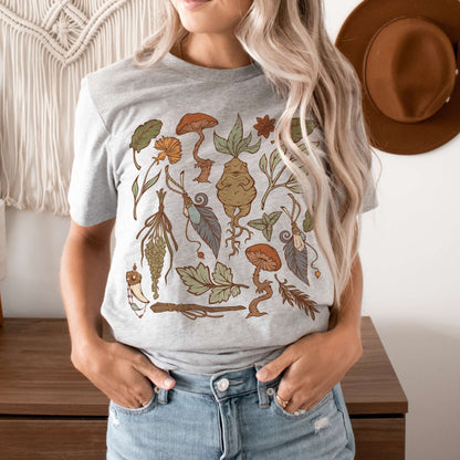 Perfect for the green witch or botany lover. This oversized witchy crewneck shirt features beautiful botanical art. The perfect addition to any witch aesthetic wardrobe.