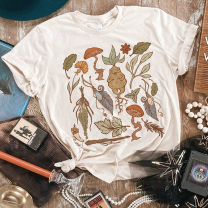 Perfect for the green witch or botany lover. This oversized witchy crewneck shirt features beautiful botanical art. The perfect addition to any witch aesthetic wardrobe.